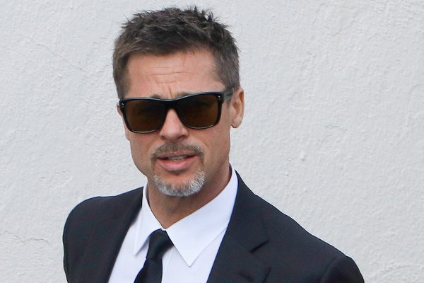 Brad Pitt exits from the back door at Craig's after Chris Cornell's memorial luncheon
